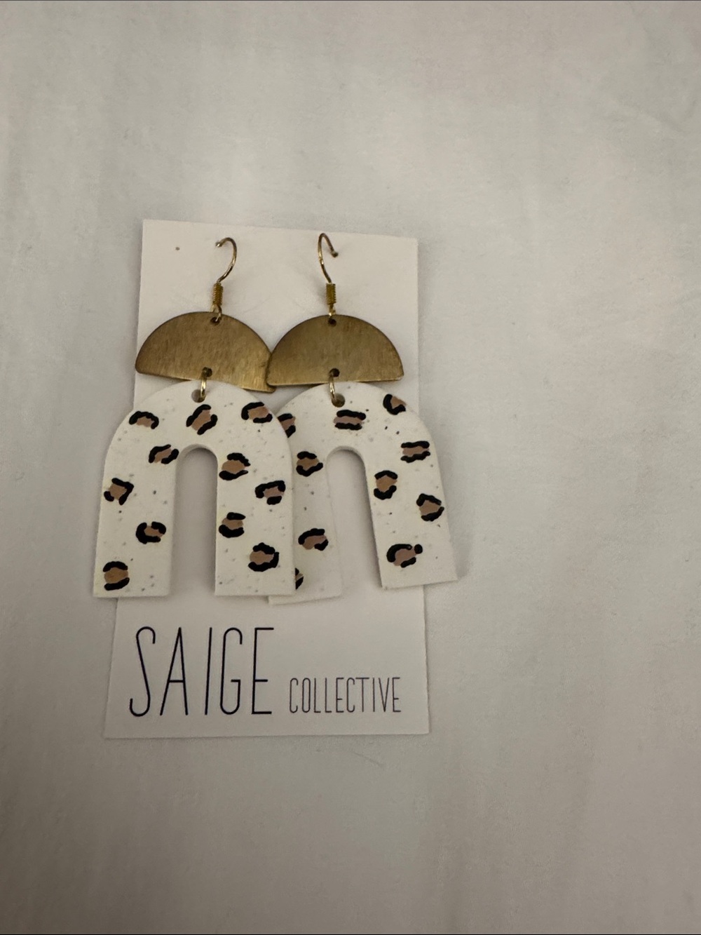 White Leopard Arch Drop Earrings with Gold Accents